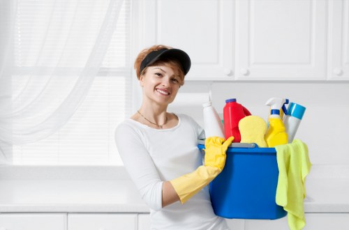 Technician cleaning carpets in Earlscourt with specialist equipment